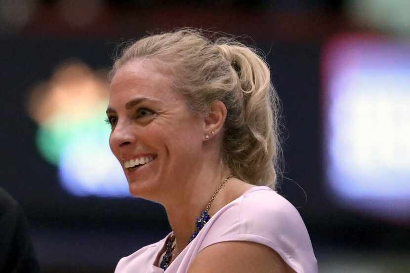Atlanta Dream head coach Nicki Collen smiles during a WNBA basketball game against the New...