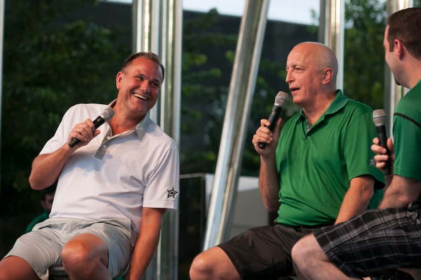 Daryl "Razor" Reaugh, left, and Dave Strader talk about the upcoming hockey season to people...