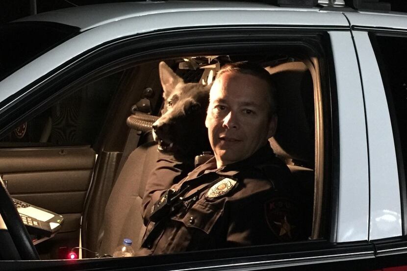 Lewisville police Officer Shane Menz and his K-9 partner Immo.