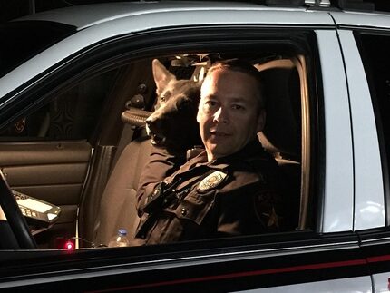 Lewisville police Officer Shane Menz and his K-9 partner Immo.