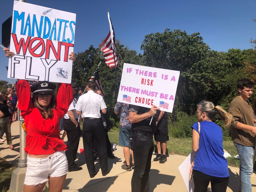 A group of about 250 American Airlines employees and supporters rally outside American...