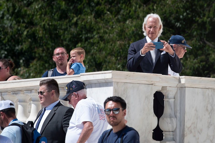 Monuments Men and Women Foundation Chairman Robert Edsel, top right,  waits for the...