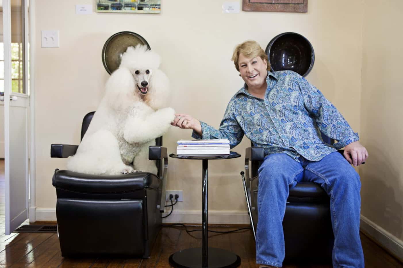 Dallas hair stylist Paul Neinast and his poodle Leopold, photographed September 9, 2011 
