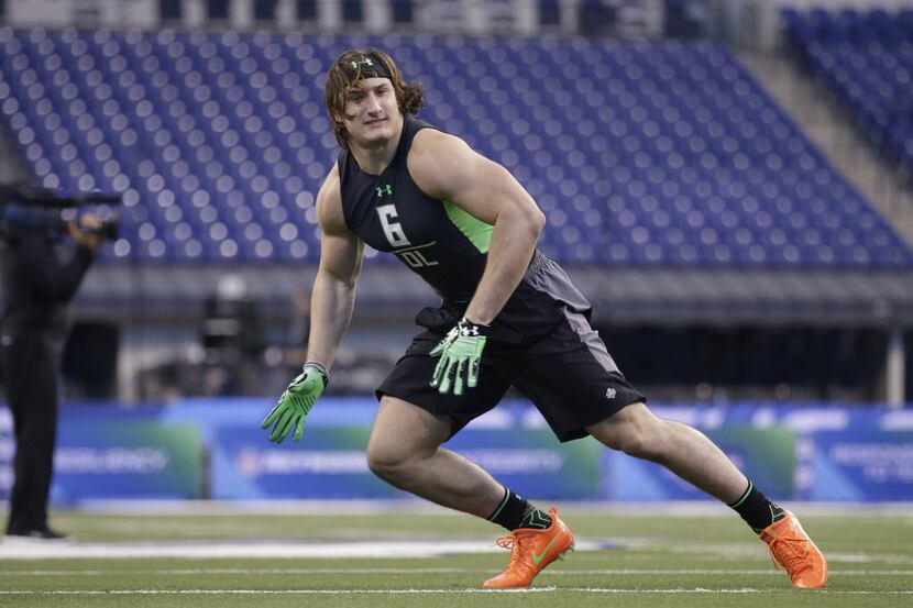 Ohio State defensive lineman Joey Bosa runs a drill at the NFL football scouting combine on...