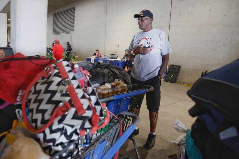 Charles Calloway of Beaumont waits Saturday at the Kay Bailey Hutchison Convention Center...