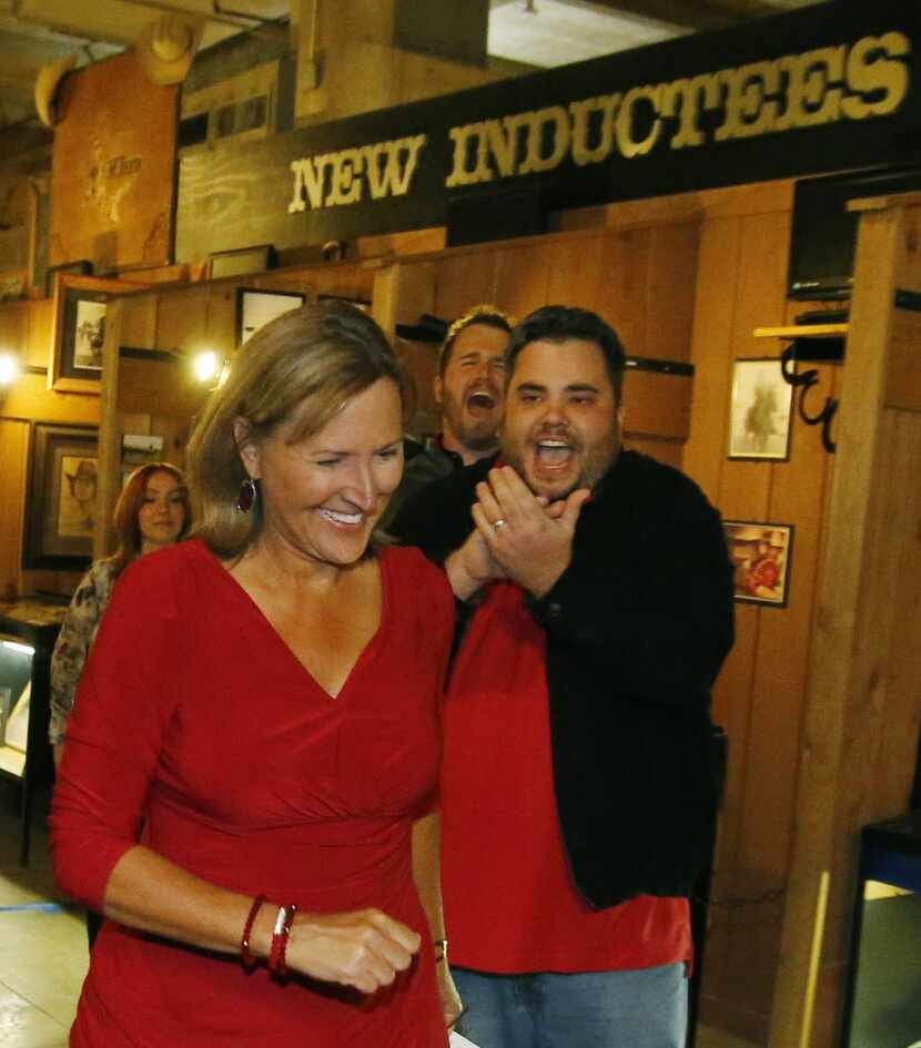 Konni Burton is all smiles as she is cheered on by supporters after being declared the...