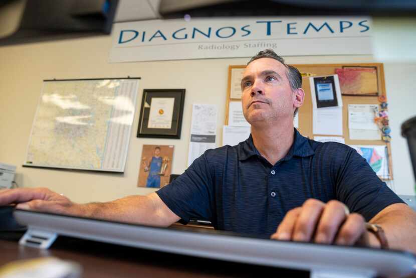 Matt Broderick, president of DiagnosTemps, works at his desk in Dallas on Aug. 11.