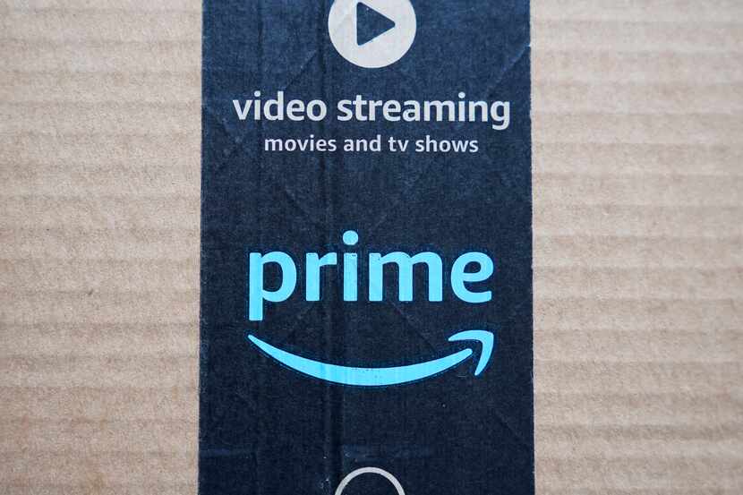 FILE - An Amazon Prime cardboard shipping box label is seen on March 17, 2023, in East...
