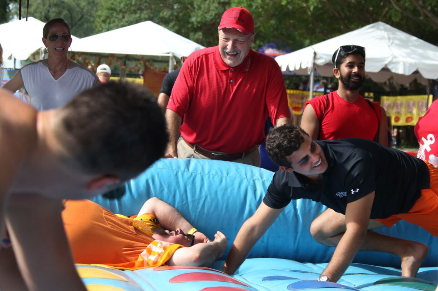 The Ticket radio personality Norm Hitzges oversees a game of twister during The Ticket's...