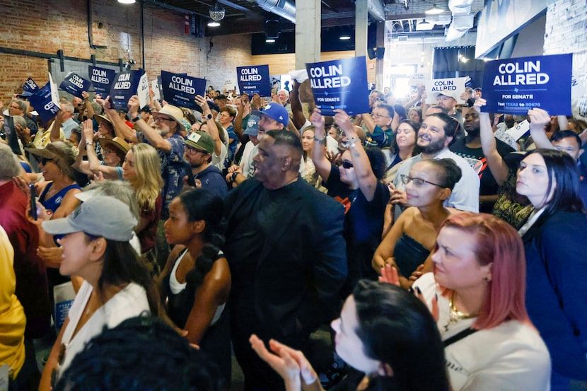 People cheer as U.S. Senate Democratic candidate Colin Allred speaks during a campaign rally...