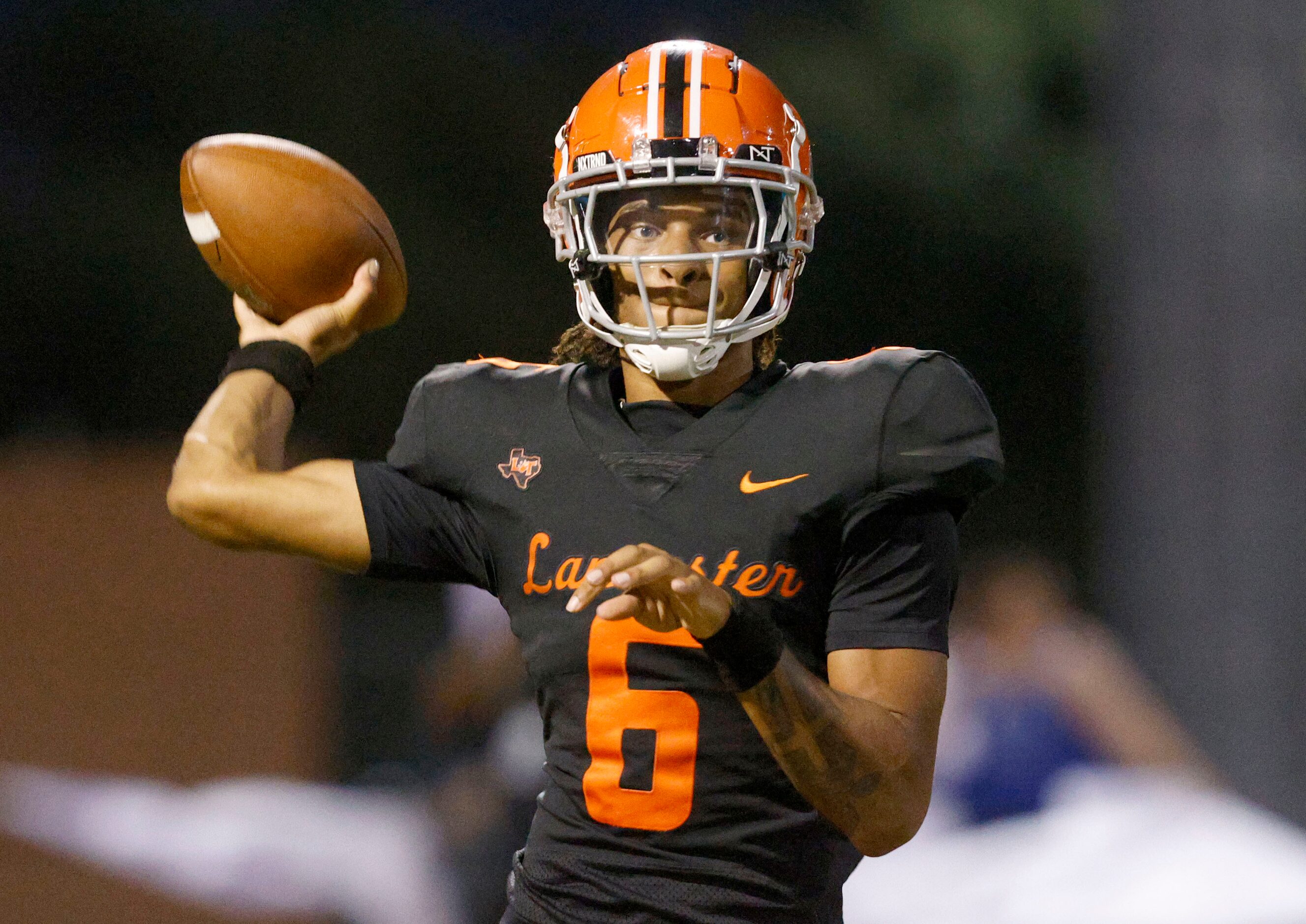 Lancaster’s quarterback Carter Jones  passes against Hebron in the first half of a high...