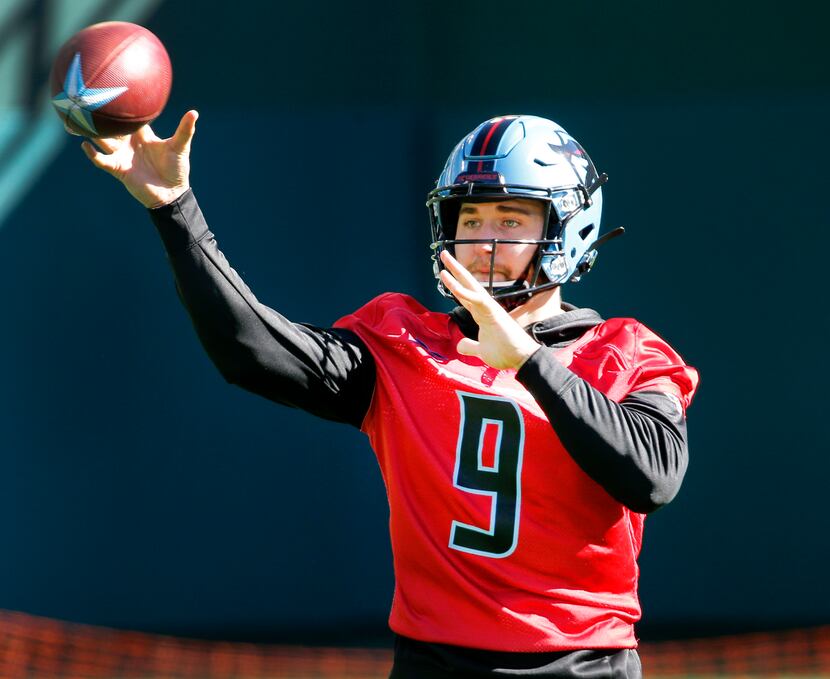 Dallas Renegades quarterback Philip Nelson (9) throws a pass during practice on the newly...