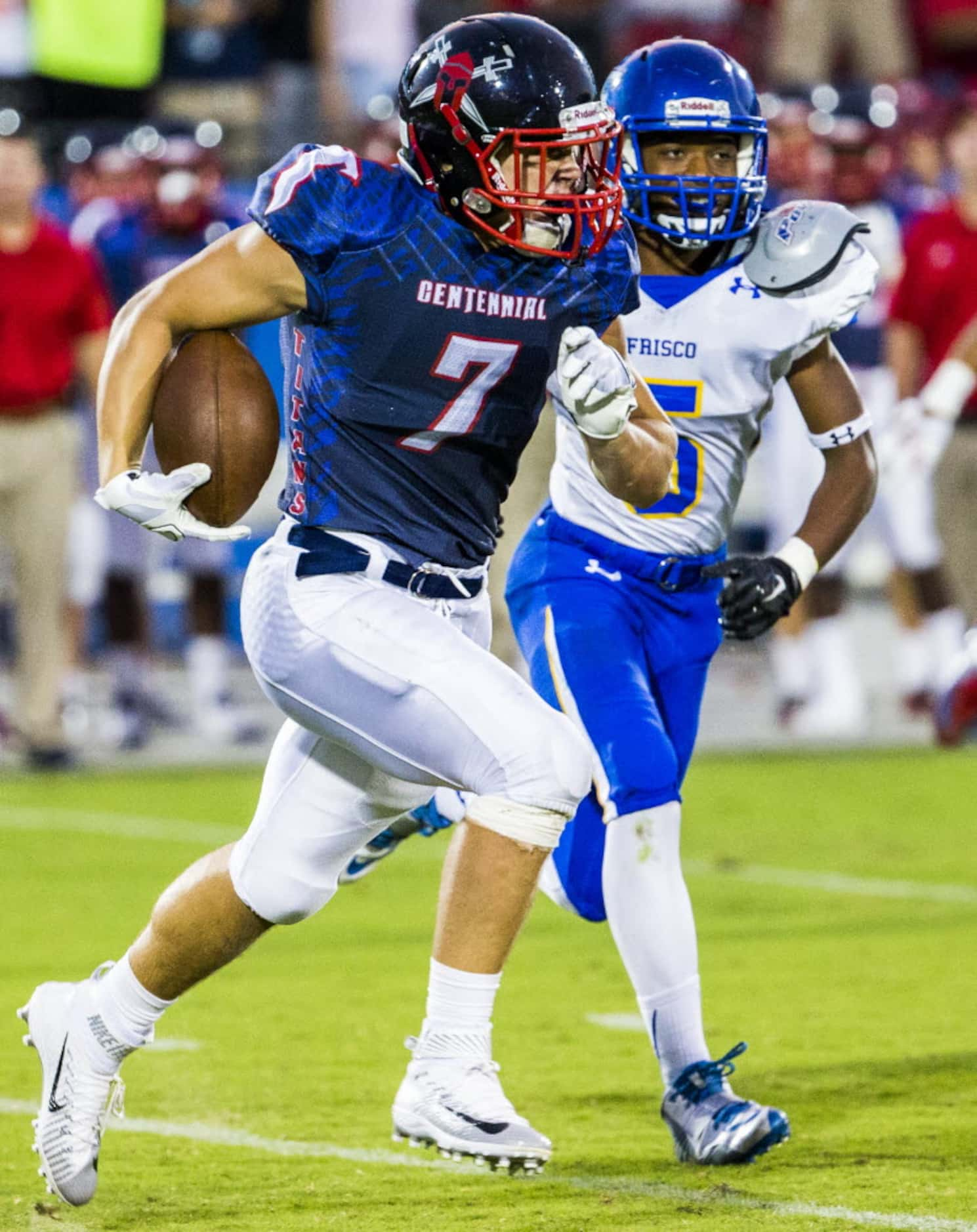 Frisco Centennial defensive back Brock Hawkins (7) runs the back after he caught an...