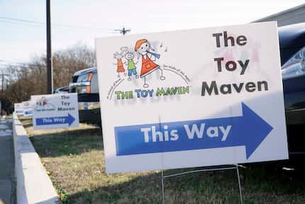 Signs out front of Toy Maven's temporary location in Dallas. Owner Candace Williams will be...