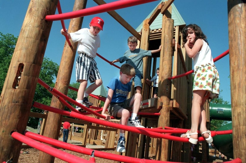 
 Justin Romeyn (left), 8, Chris Herrin, 8, sitting, Austin Jennings, 7, and Kelsey Krenek,...