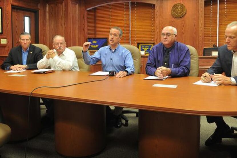 
Rep. Mac Thornberry (center) updated officials on developments with the government this...