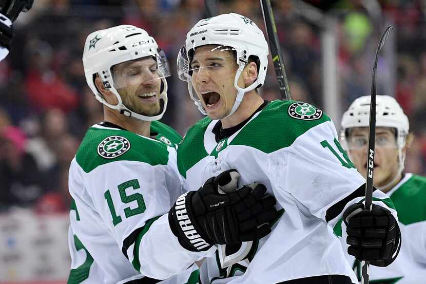 Dallas Stars center Tyler Pitlick, right, celebrates his goal with left wing Blake Comeau...