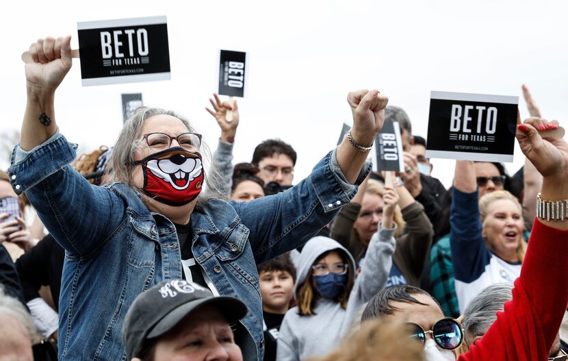 Beto O'Rourke supporters cheer as he speaks at a rally in Dallas on Sunday, Nov. 21, 2021....