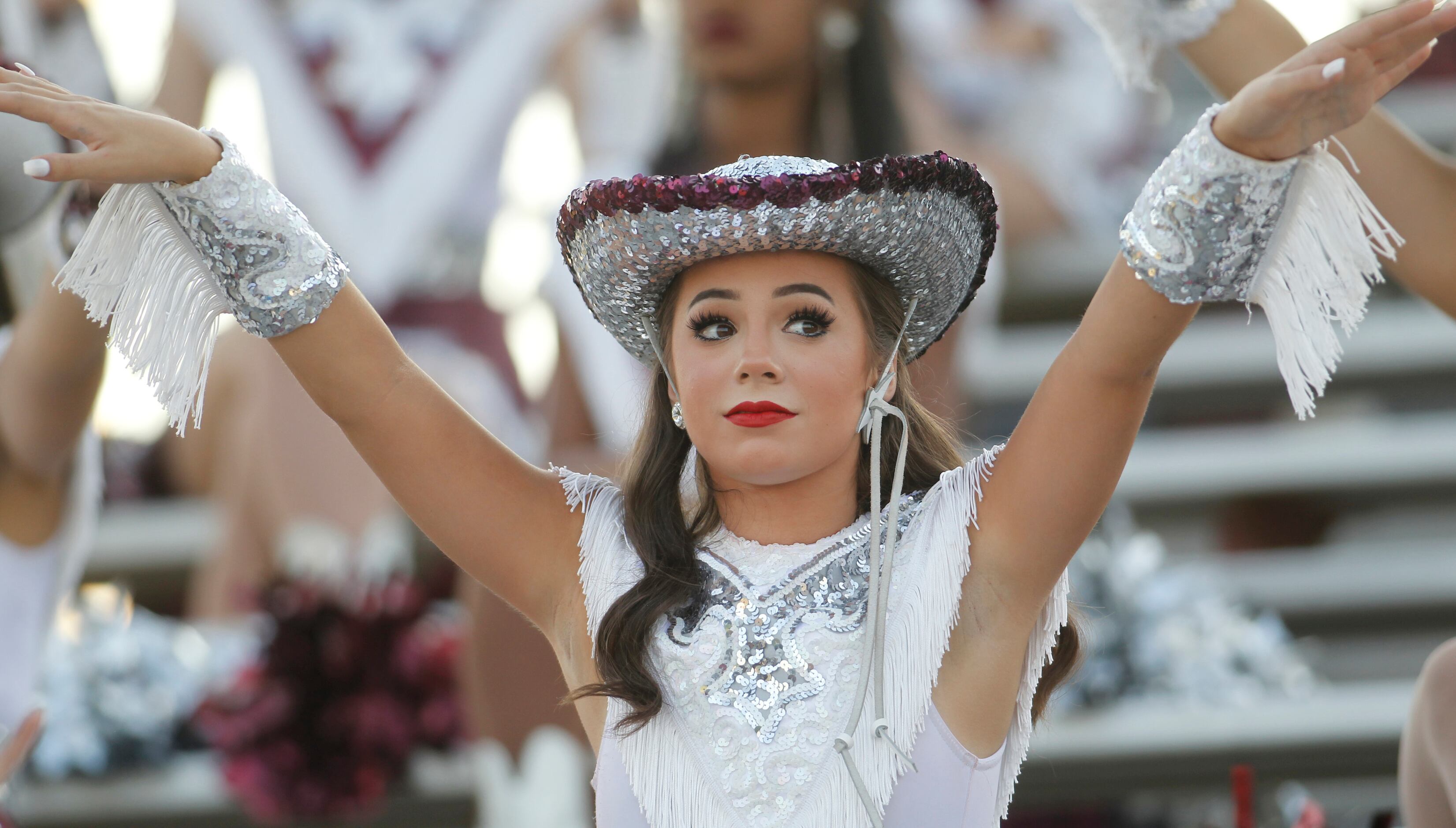 Red Oak Hawkettes 1st Lieutenant Isabella Francis performs with other members of the drill...