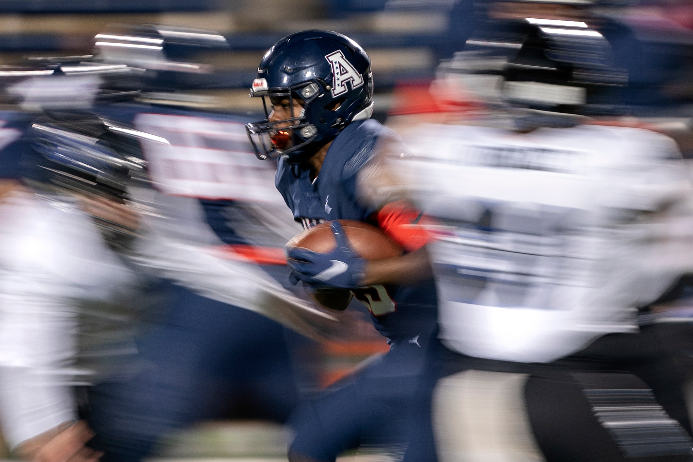 Allen junior running back Kaden Ebron (45) carries the ball against Hebron during the first...