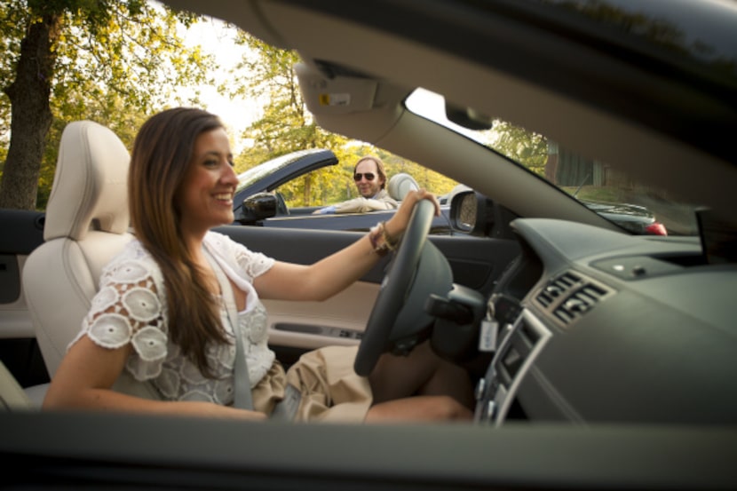 Christopher Wynn in the Infiniti G37 Convertible Sport 6MT (back) and Christina Geyer in the...