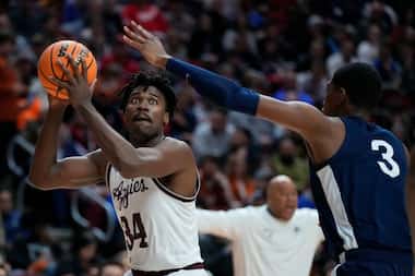 Texas A&M forward Julius Marble (34) shoots over Penn State forward Kebba Njie (3) in the...