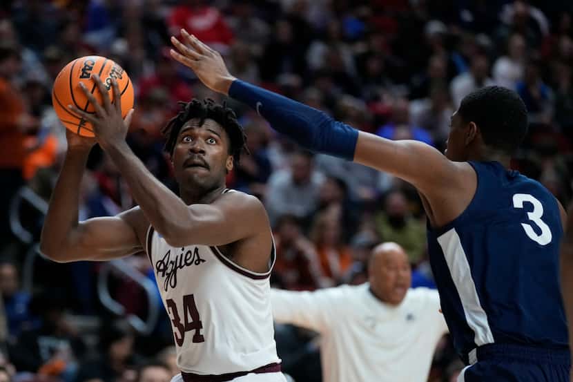 Texas A&M forward Julius Marble (34) shoots over Penn State forward Kebba Njie (3) in the...