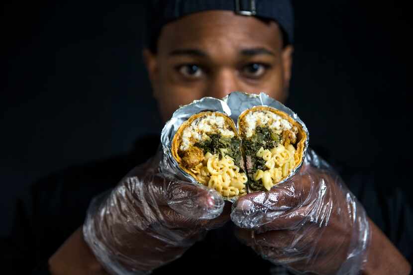 Jessie Washington, Brunchaholics owner and chef, holds his signature Soul Food Burrito.