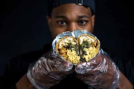 Jessie Washington, Brunchaholics owner and chef, holds his Soul Food Burrito.