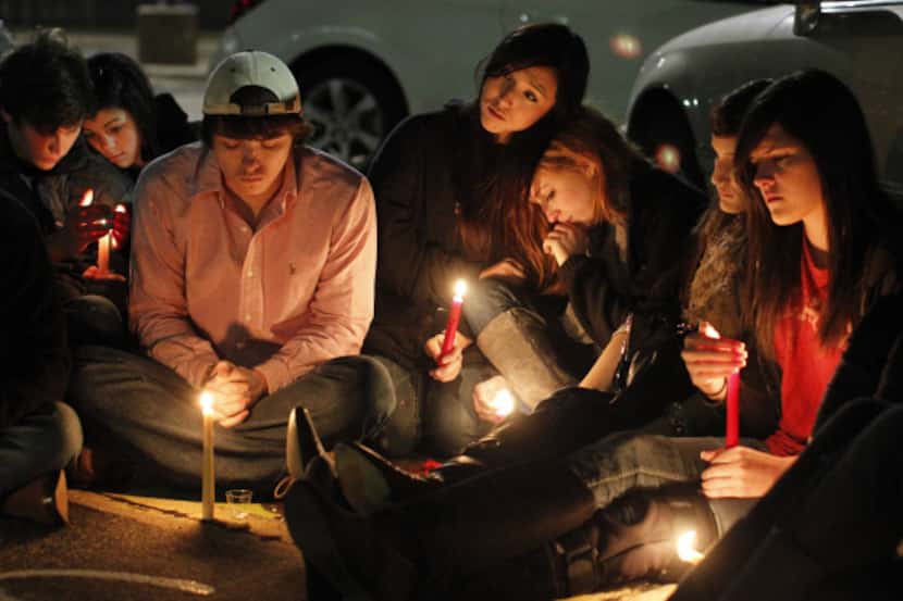 Students attended a candlelight vigil at Colleyville Heritage High School on Monday night.