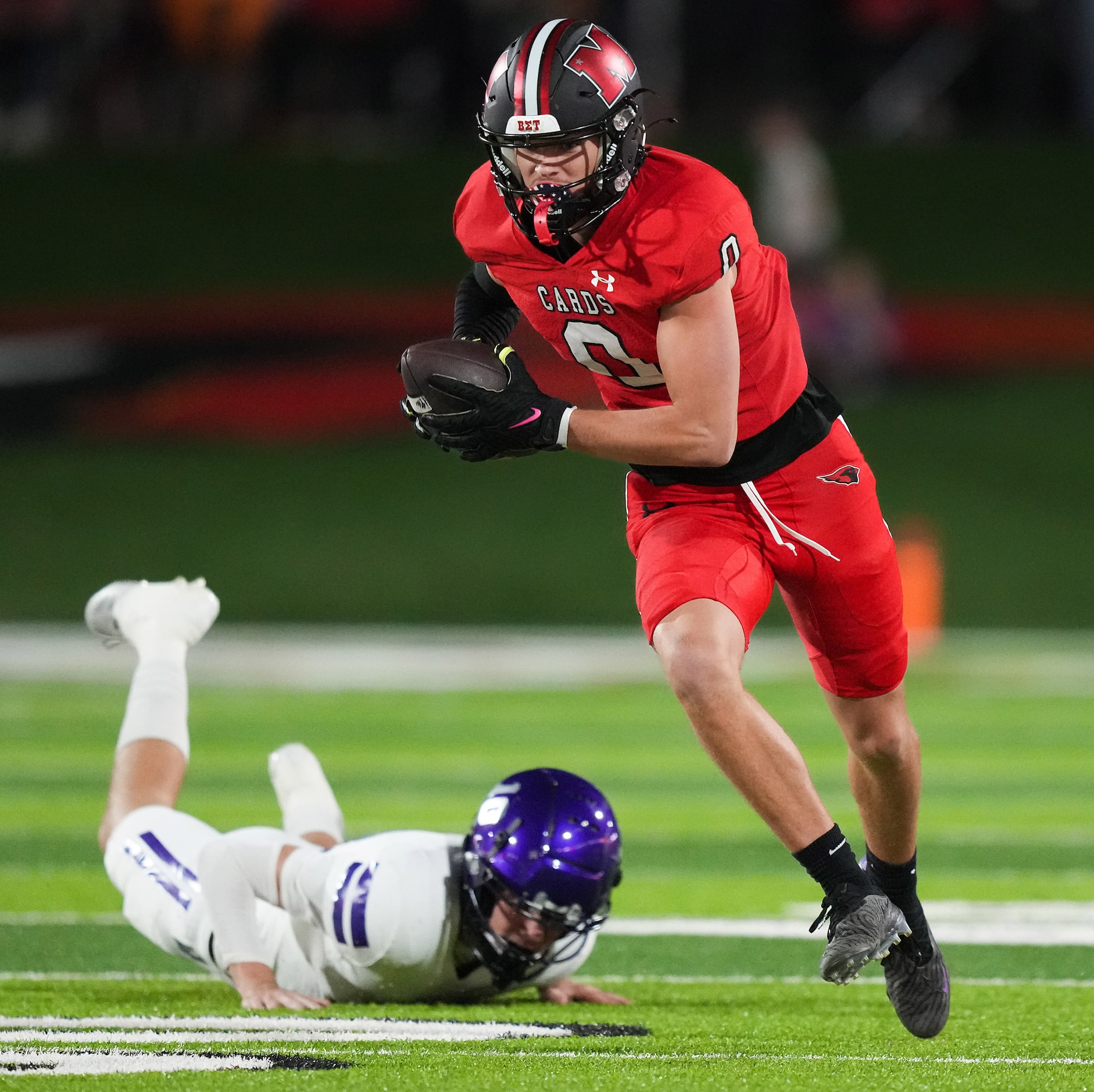 Melissa wide receiver Brett Pool (0) gets past Anna defensive back Aiden Palmer (10) on a...