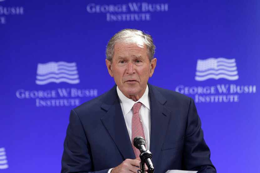 Former U.S. President George W. Bush speaks at a forum sponsored by the George W. Bush...