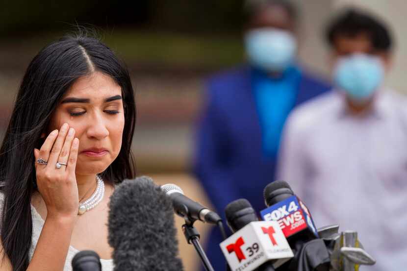Skyline High School senior Alyssa Rodriguez wiped away a tear while addressing a group...