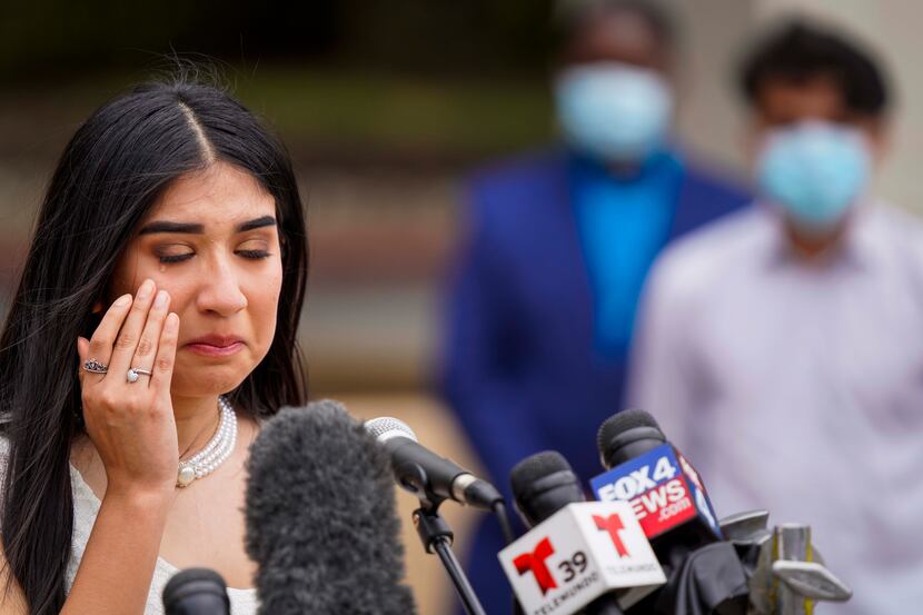 Skyline High School senior Alyssa Rodriguez wiped away a tear while addressing a group...