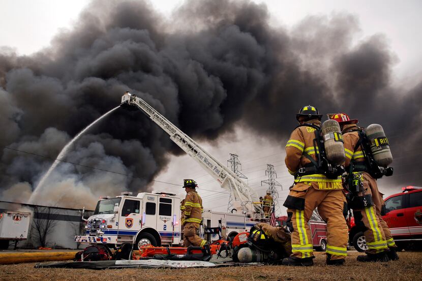 Fort Worth firefighters respond to a large 5-alarm fire at the Advanced Foam Recycling...