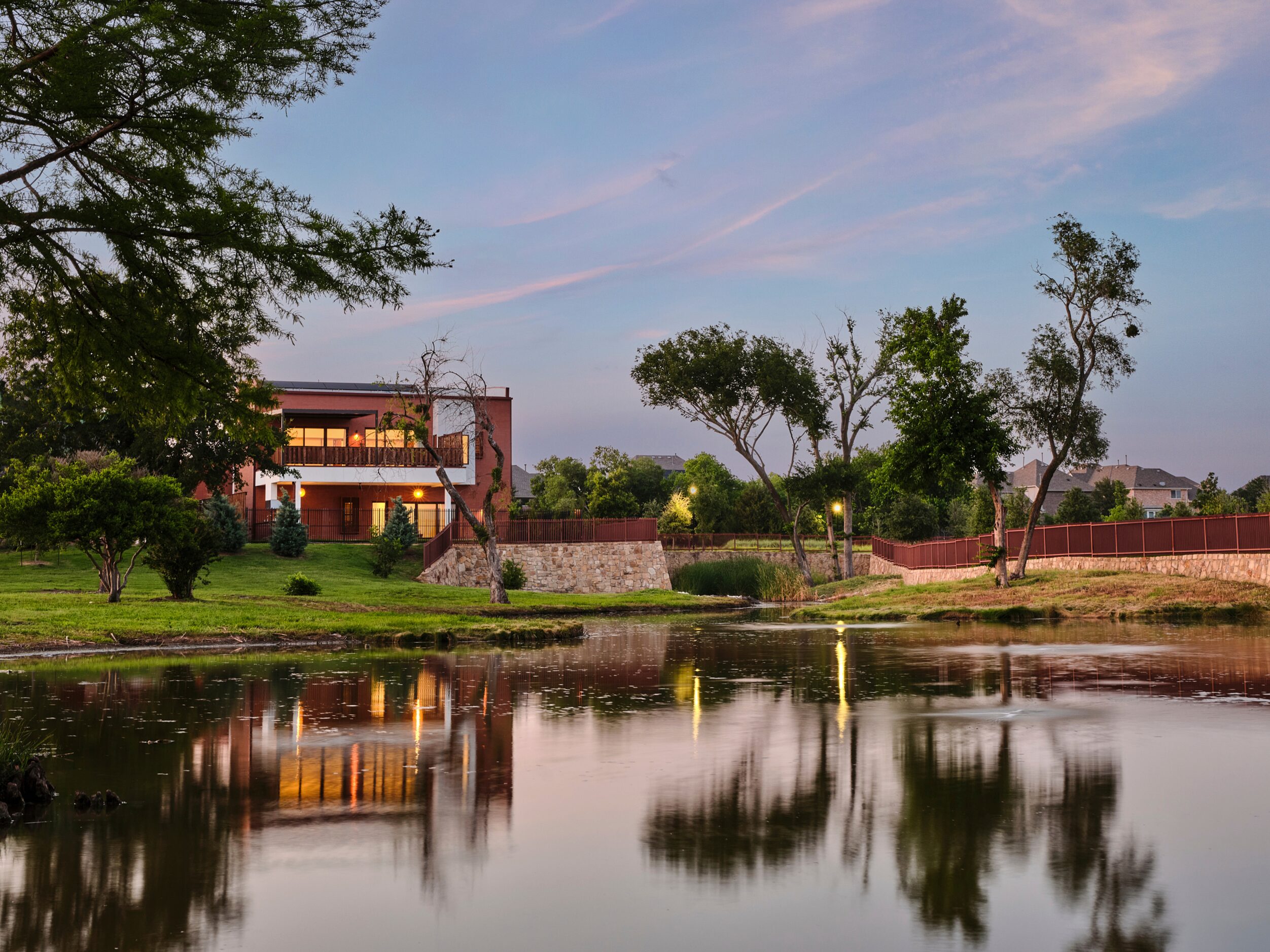 The community is located on a 900-tree property along Rowlett Creek.