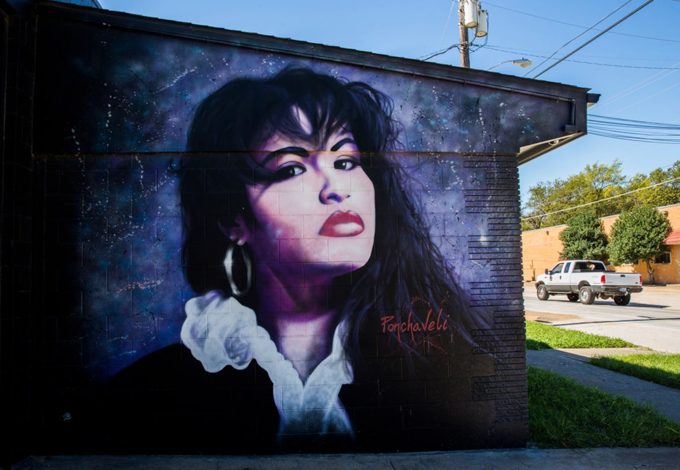 A mural of singer Selena is displayed at 914 W. Commerce St.