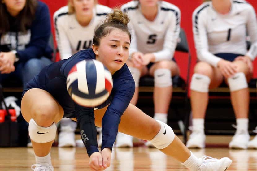 Flower Mound junior Sarah Martinez comes up with one of her match-high 31 digs in Tuesday's...