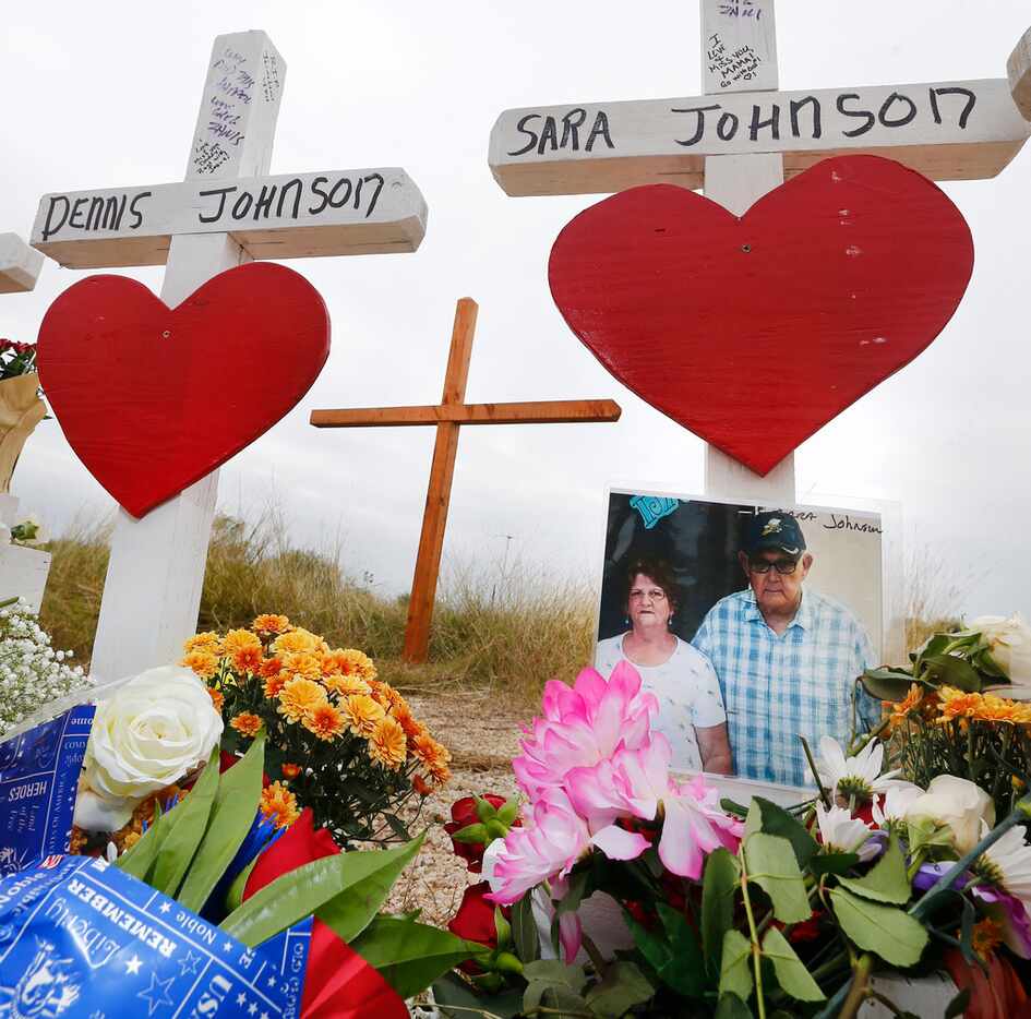 A photo of Dennis and Sara Johnson at a memorial in front of First Baptist Church in...