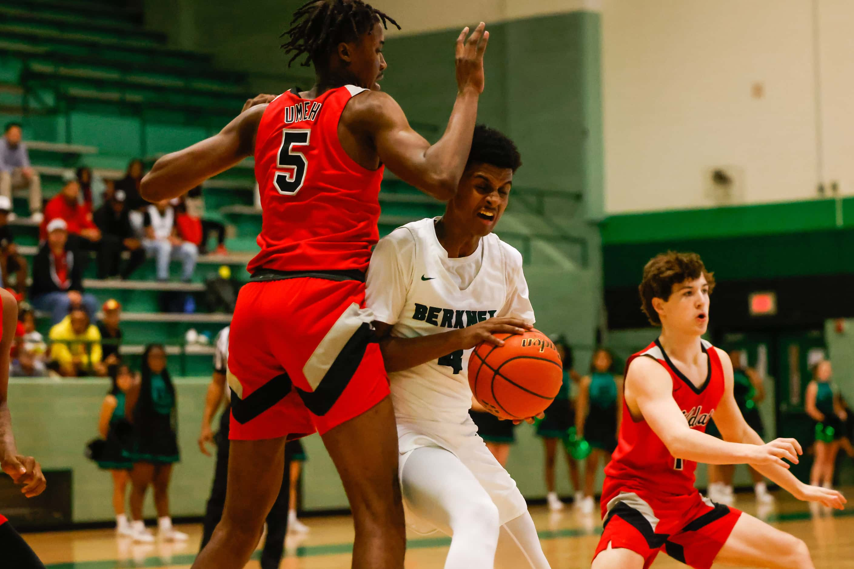 Berkner High School' Adonai Rezene #4 tries to pass a block from Lake Highlands High School'...