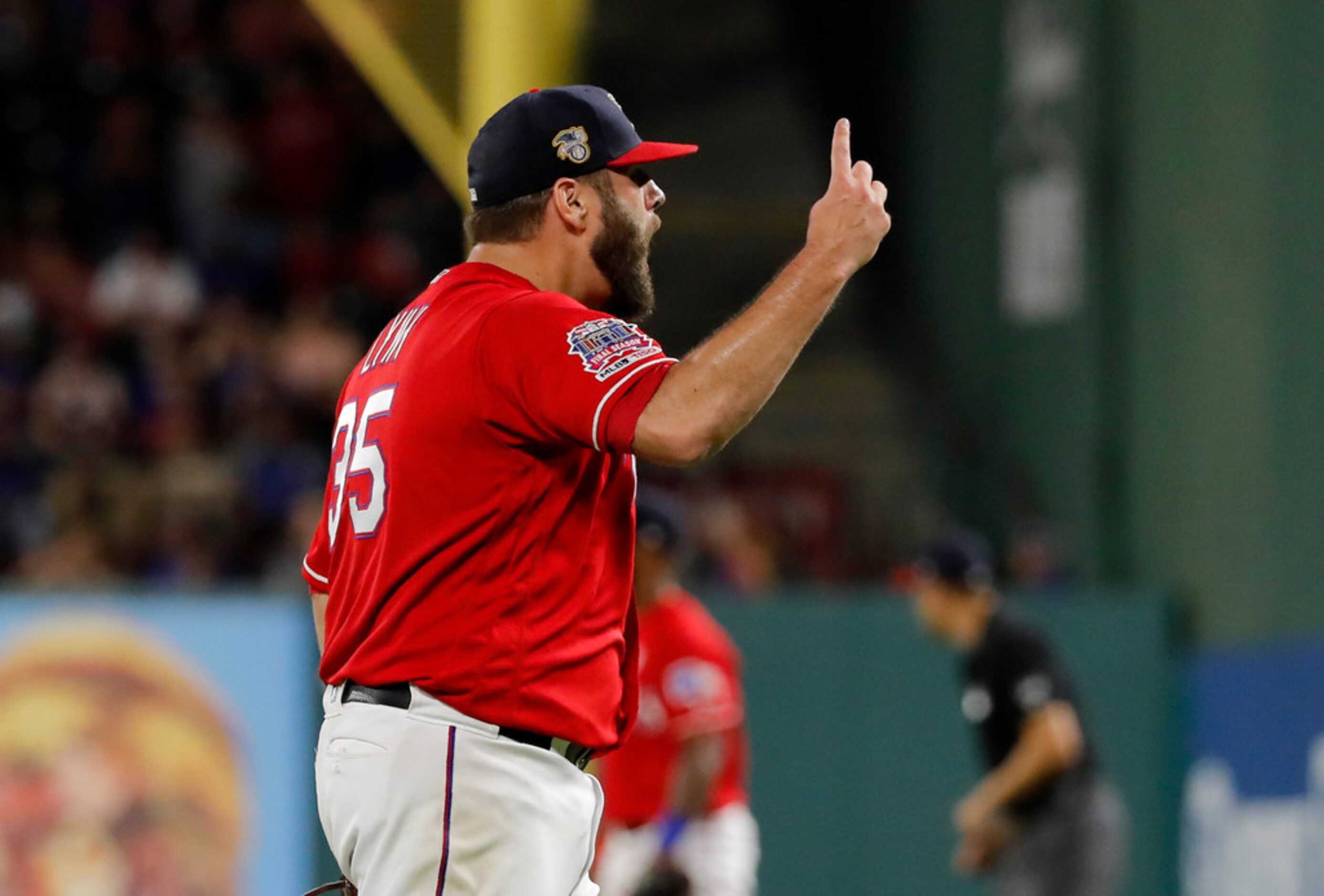 Texas Rangers' Lance Lynn celebrates after getting Los Angeles Angels' Shohei Ohtani to fly...