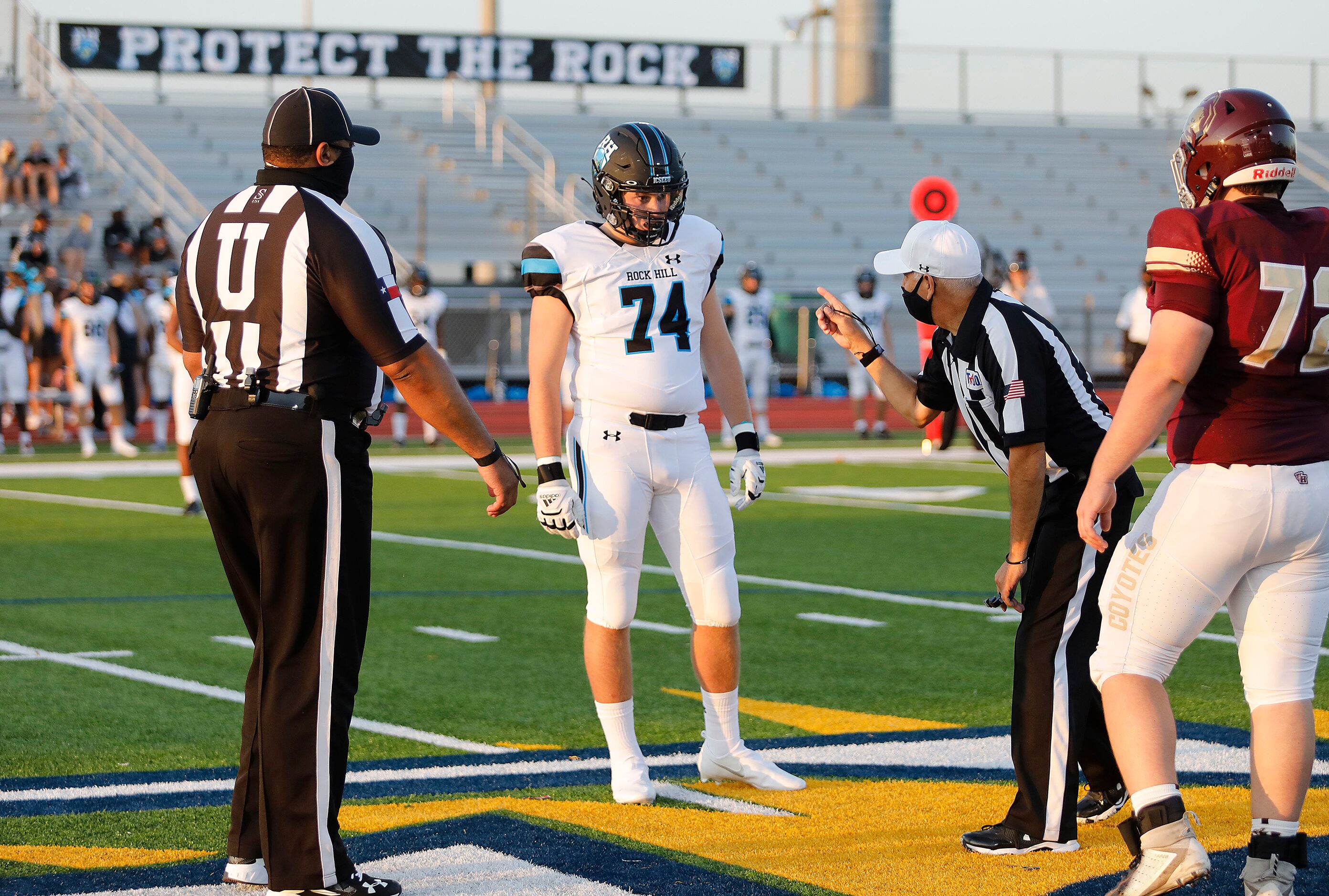 Rock Hill High School team captain Brooks Richardson (74) wins the school’s first coin toss...