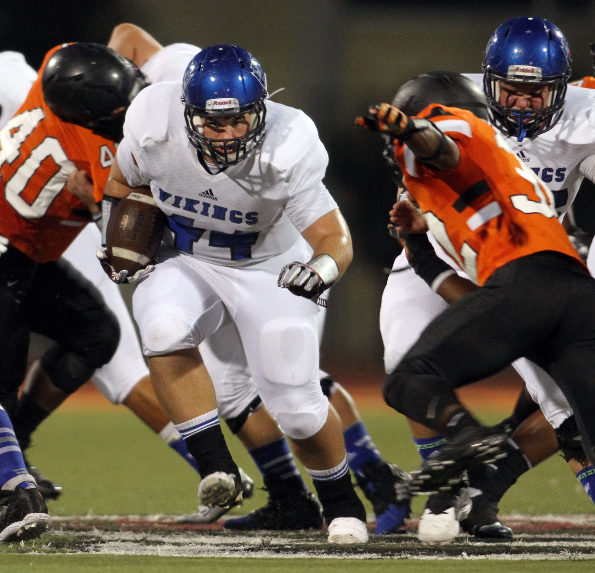 Fort Worth Nolan running back Ty Coleman (44) rambles into the Lancaster Tigers secondary...