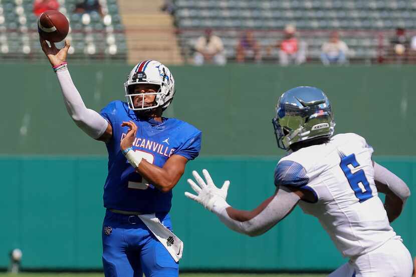 Duncanville quarterback Grayson James throws a pass against Florida's IMG Academy on October...