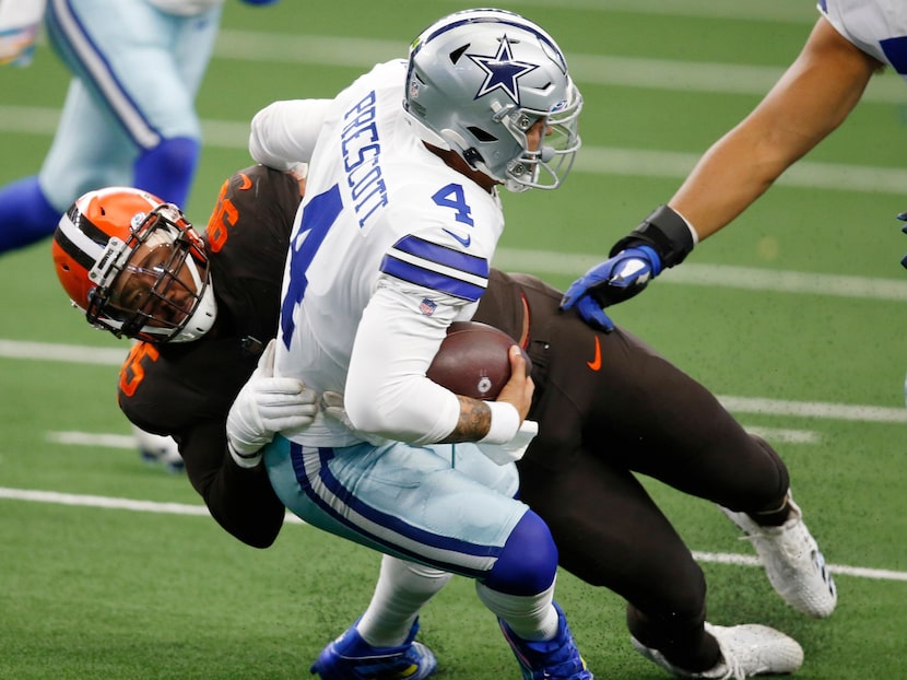 Cleveland Browns defensive end Myles Garrett (95) sacks Dallas Cowboys quarterback Dak...