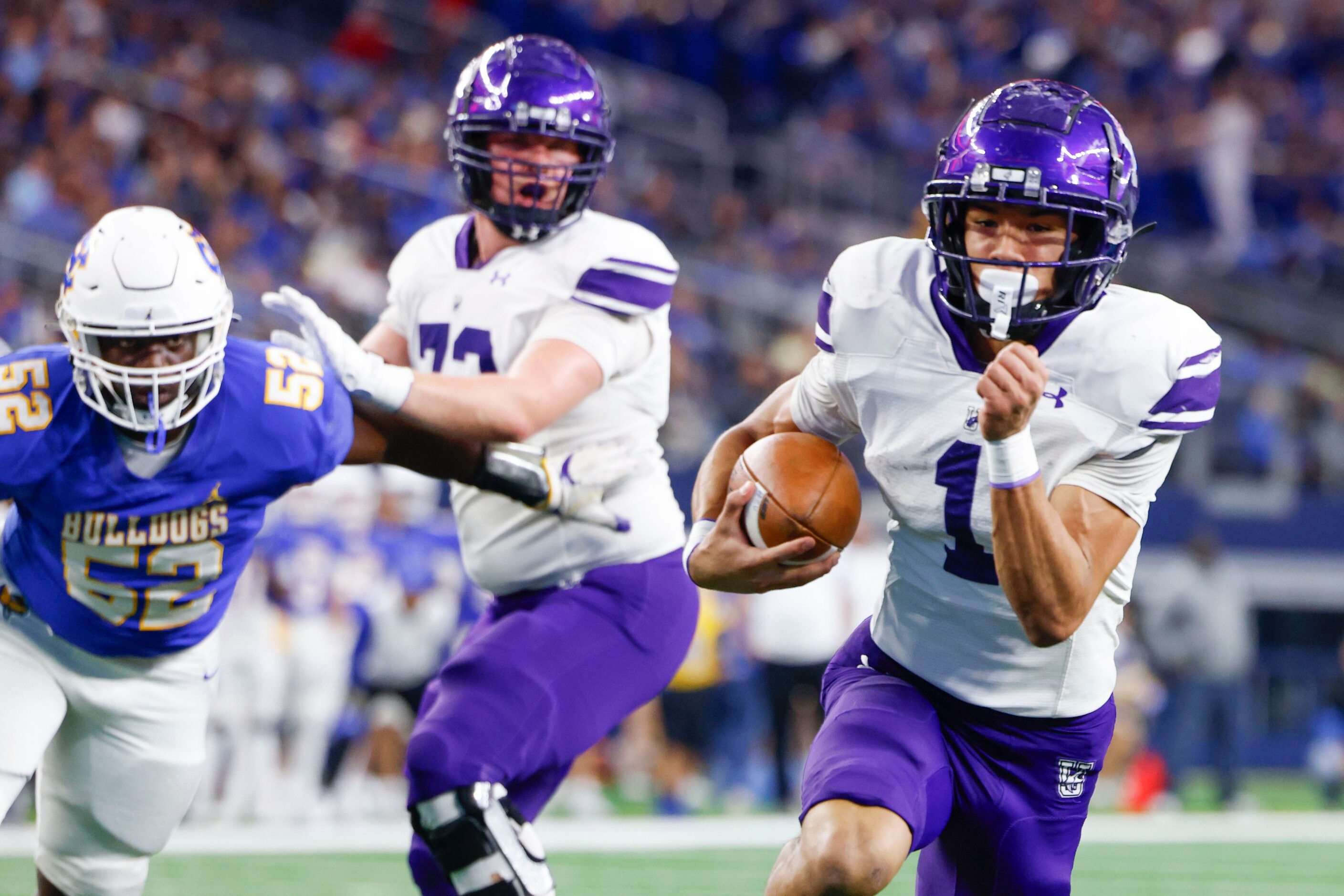 Anna High’s Edward Chumley (right) runs to the end zone to score a touchdown against Tyler...