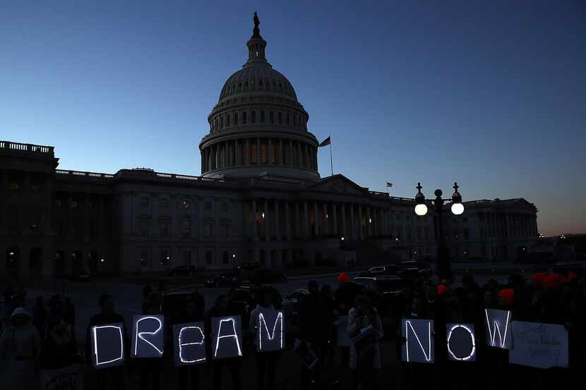WASHINGTON, DC - JANUARY 18:  Protesters advocating for the DREAM Act hold a candlelight...