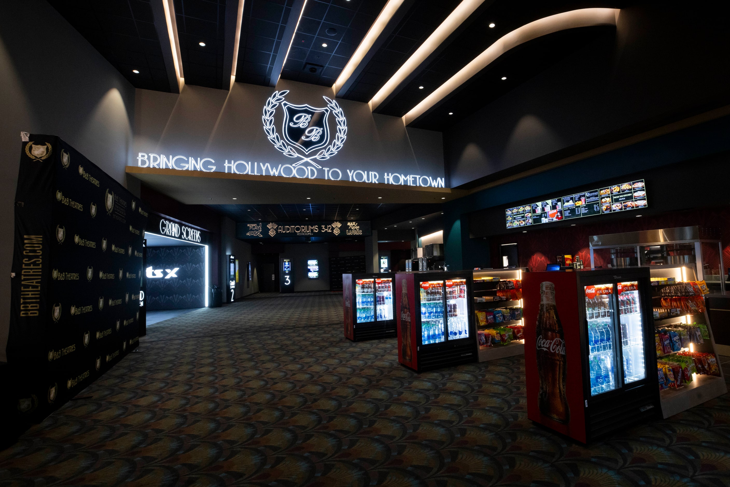 The concession area of B&B Theatres, a new entertainment facility opening with 12 cinema...