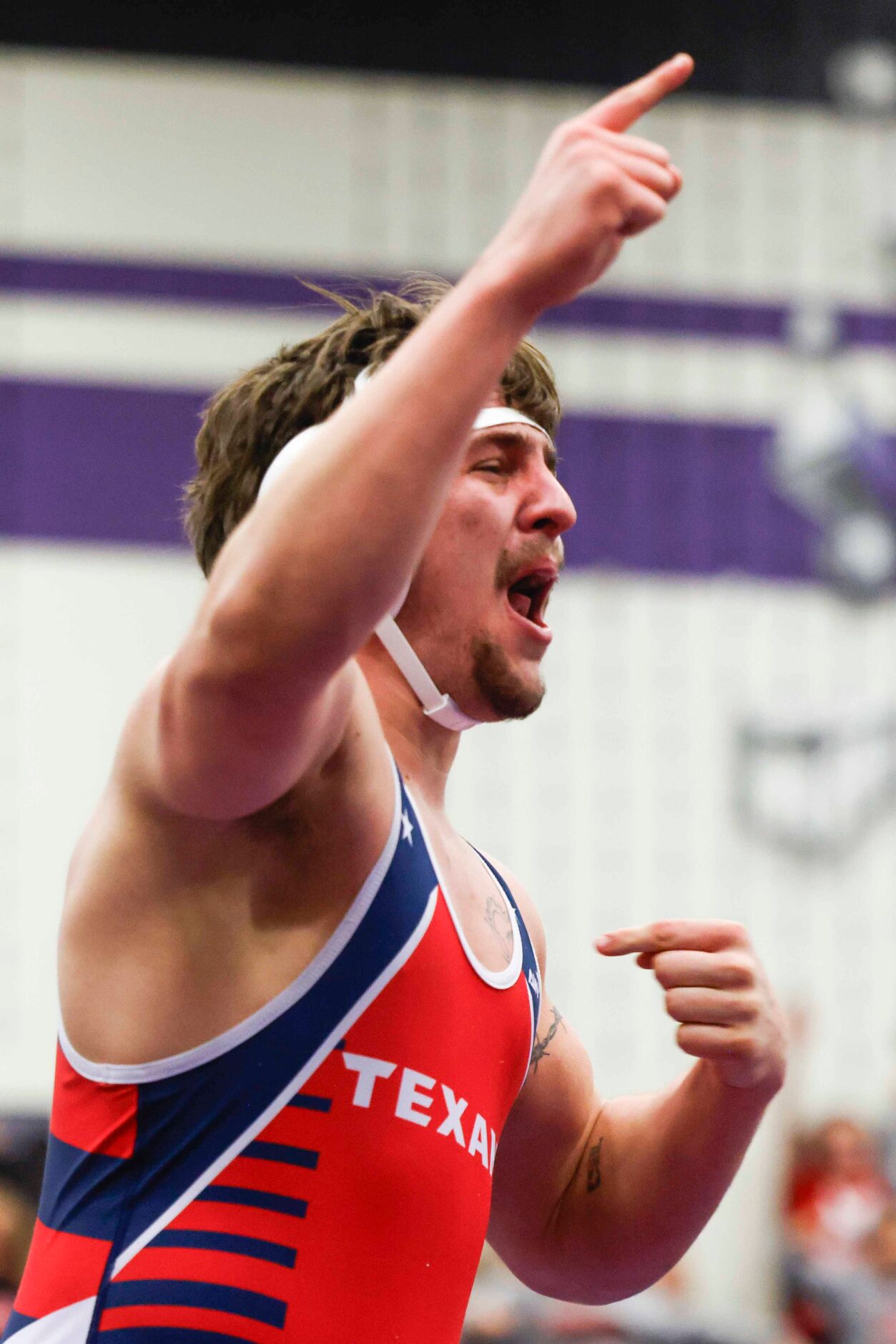 Jaxson Lee of Northwest cheer over his win agianst Jett Hanlin of Frisco Reedy (bottom)...