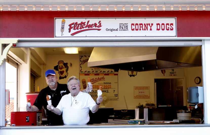 Bill (left) and Skip Fletcher tasted some of their first corny dogs of the State Fair season...
